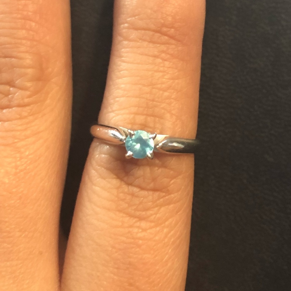 White gold band blue zircon solitaire